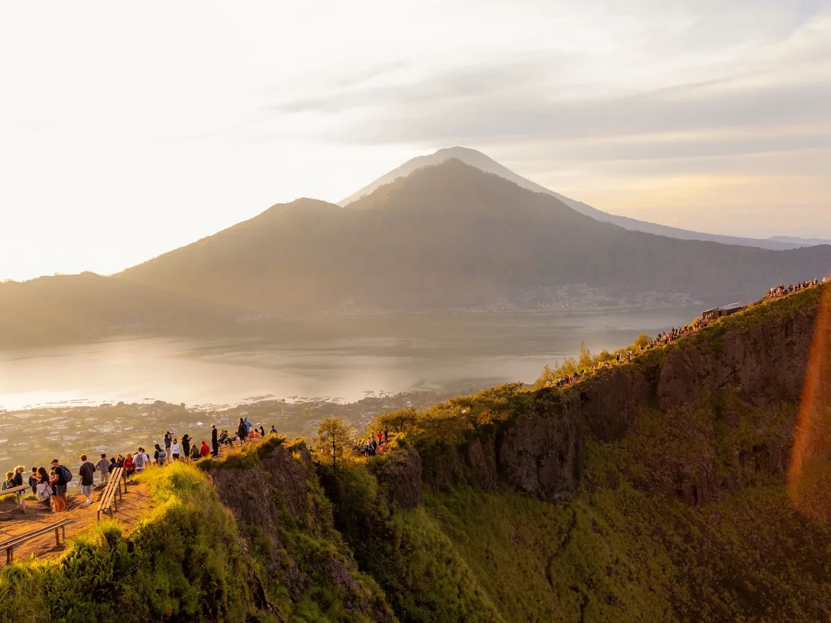 Sunrise above the clouds from the summit of Mount Batur