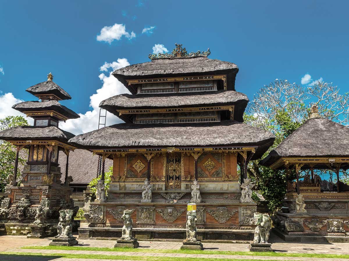 Temple courtyard with carved stone gates, Bali
