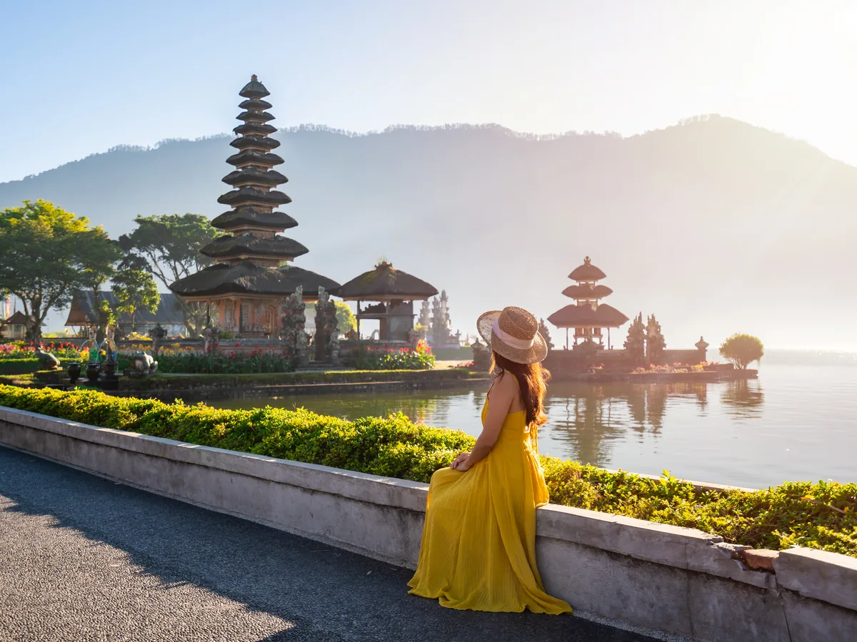Visitors in the lakeside gardens at Ulun Danu Beratan